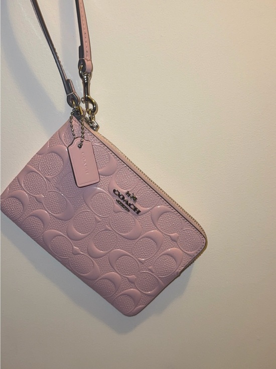 Coach Handbags - COACH Pink Signature Embossed Leather Wristlet
